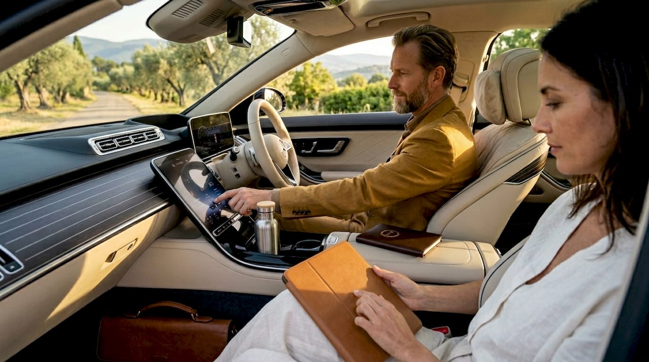 Couple enjoying comfort inside 2026 luxury sedan
