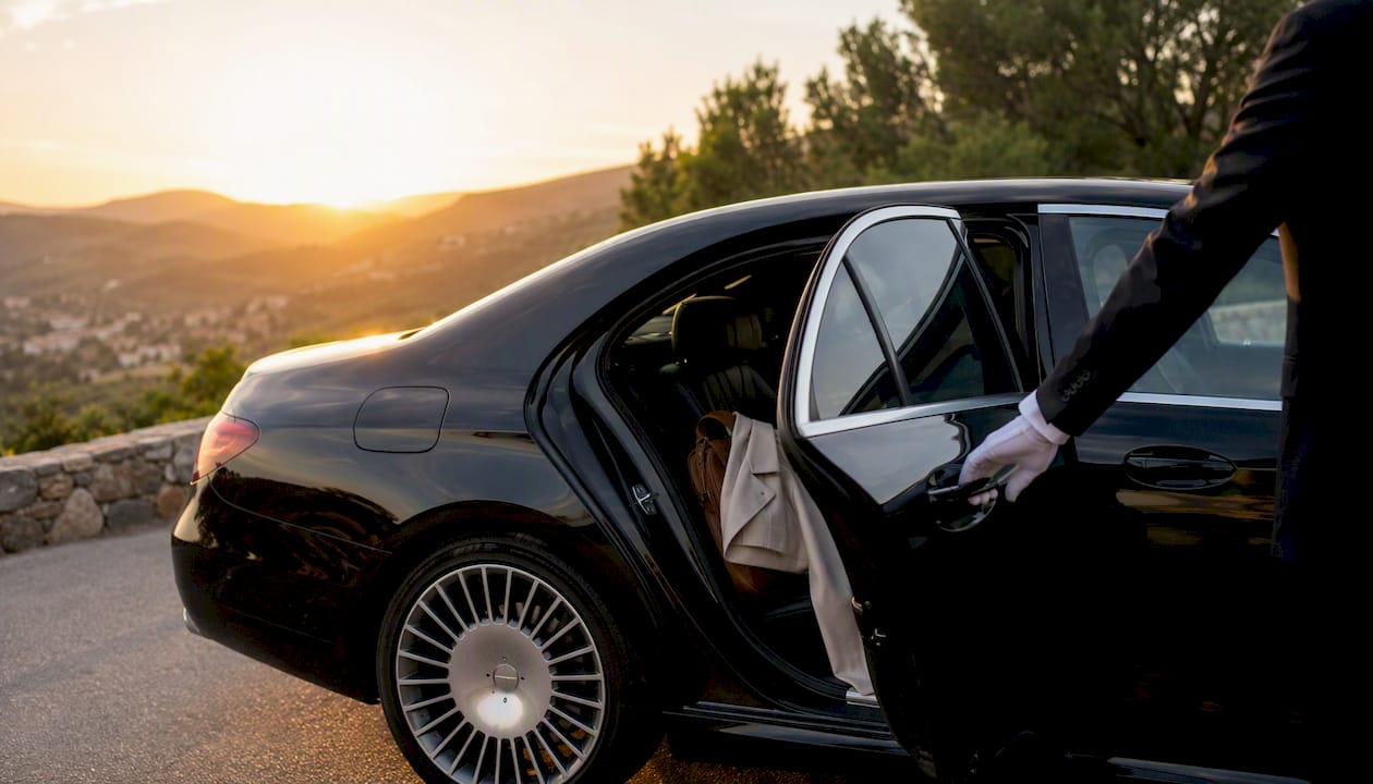 Mercedes-Benz sedan private transfer with chauffeur on French Riviera roadside