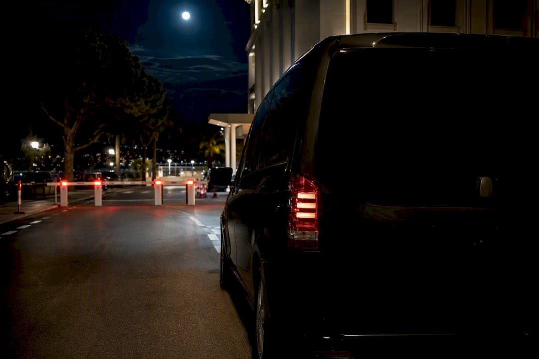 Mercedes van parked near emergency corridor setup in Monaco at dusk