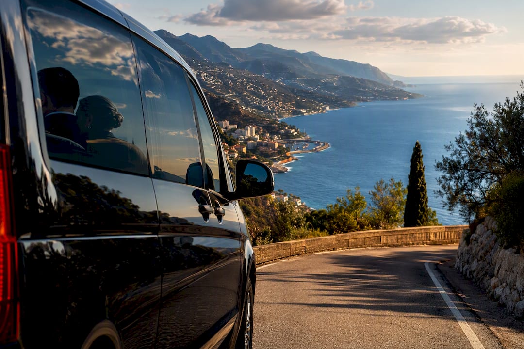 Mercedes van beginning a private chauffeur drive from Menton toward Milan on the French Riviera route