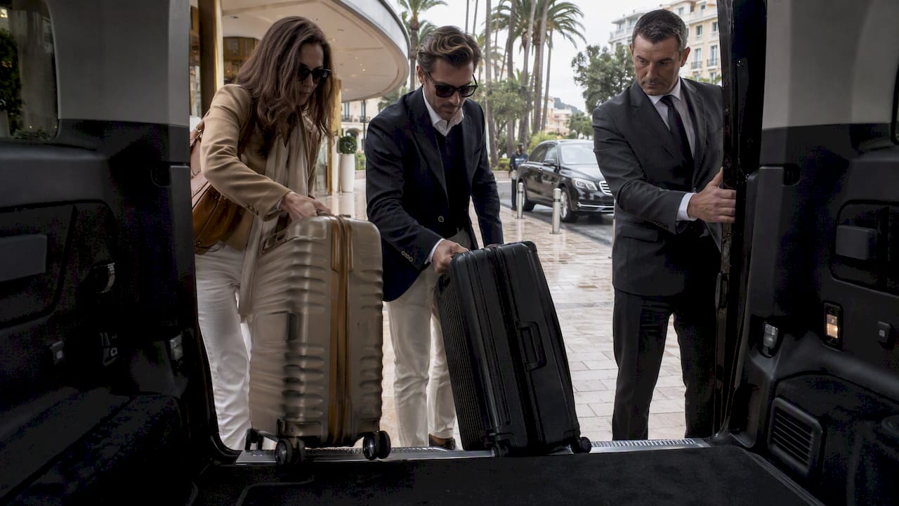 Mercedes-Benz Van 8 pax loading luggage for private chauffeur transfer in Cannes