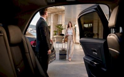 Private chauffeur Mercedes sedan waiting for a fixed transfer at a Cannes hotel on the French Riviera