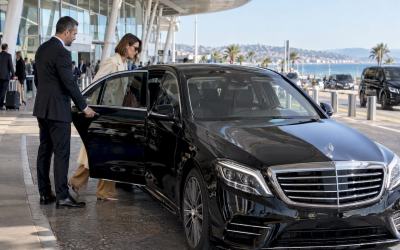 Mercedes-Benz sedan collecting a traveler for a private Nice airport transfer at Nice Côte d’Azur Airport.